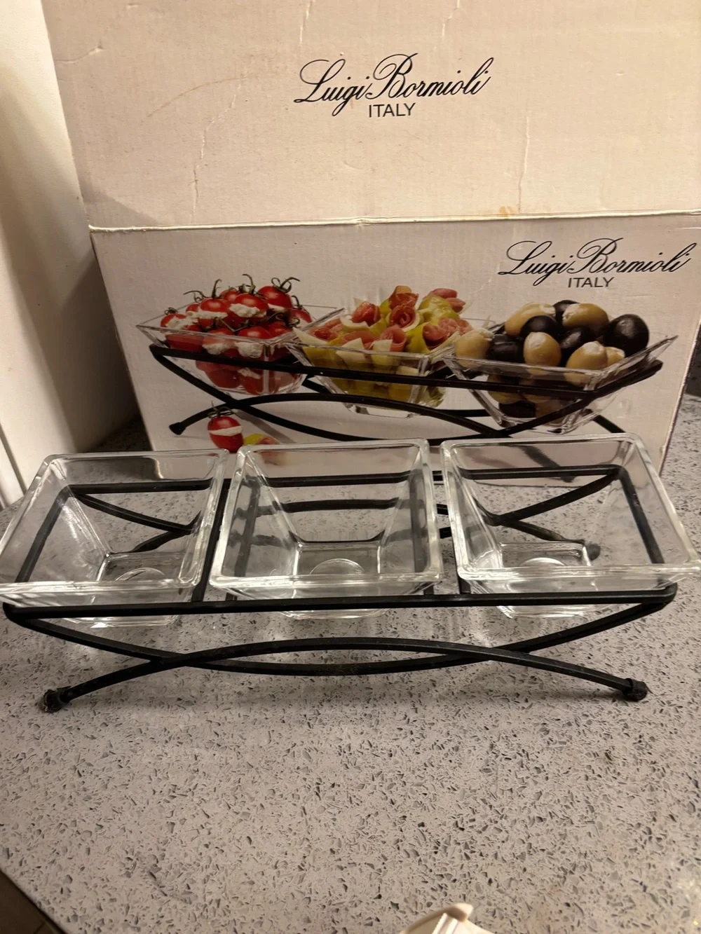 Bormioli Luigi Bormioli Italy iron stand with serving dishes.